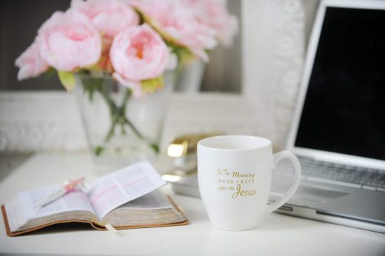 A coffee mug sitting on top of a table.