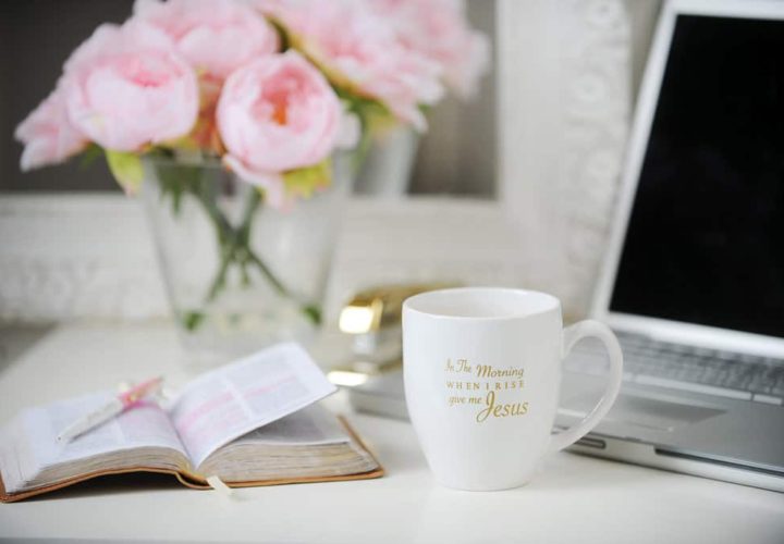 A coffee mug sitting on top of a table.