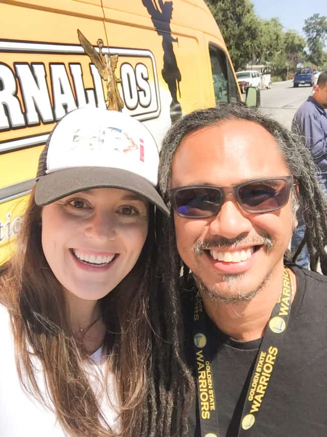 A man and woman smiling for the camera.